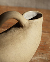 double mouthed stout vessel with handle, in raw cream