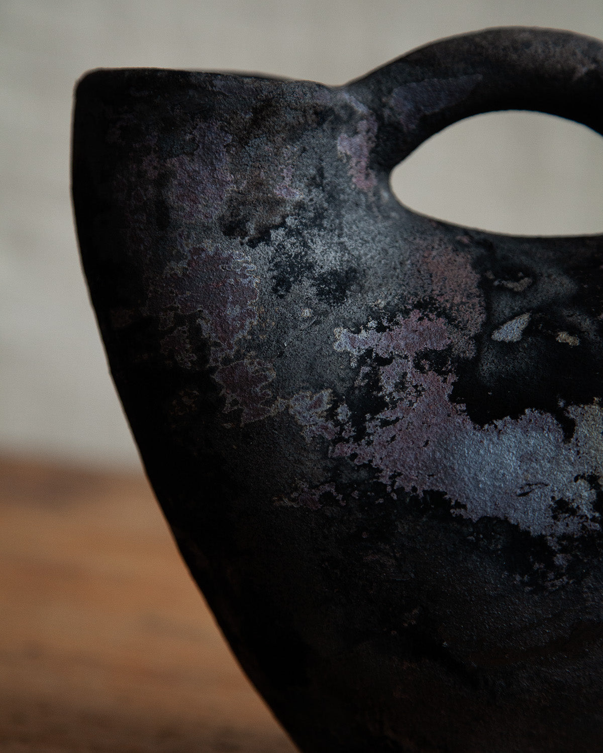 double mouthed vessel with handle, in Black Velvet Raku