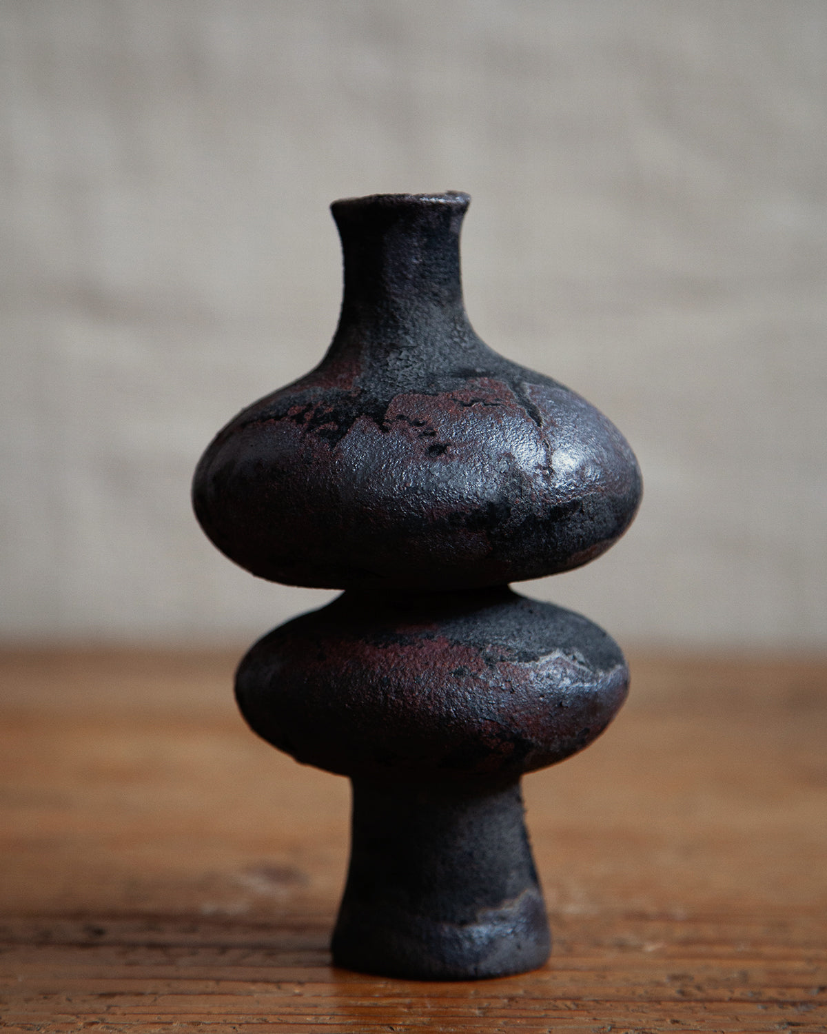 figurative vessel, in black stoneware clay, black velvet raku #1