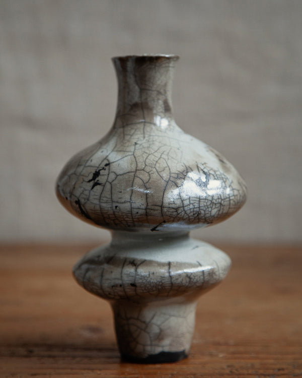 figurative vessel, in white stoneware clay, white crackle raku #1