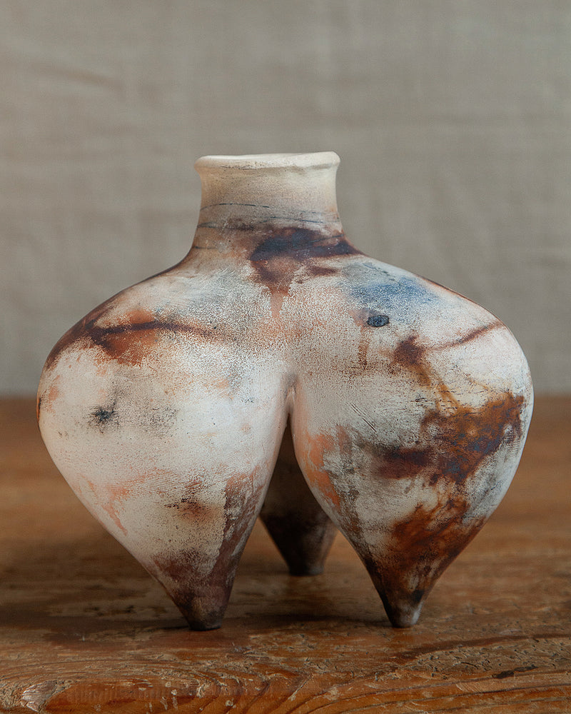 Tripod vessel, in white smokefired stoneware clay