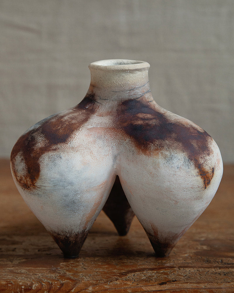 Tripod vessel, in white smokefired stoneware clay
