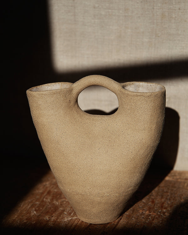 double mouthed vessel with handle, in raw cream