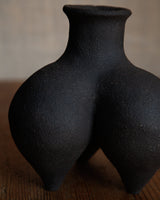 Tripod vessel in black textured stoneware #1